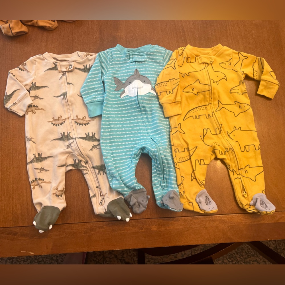 Three cute Carters onsies.